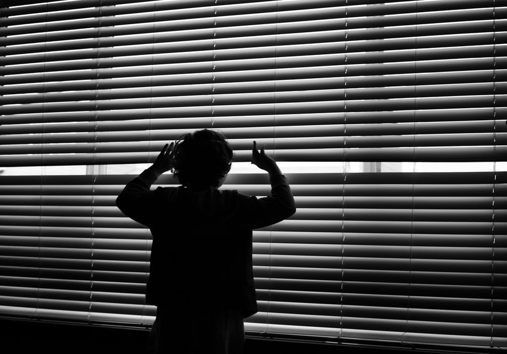 Looking out through blinds